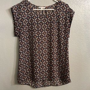 DR2 sleeveless geometric print blouse